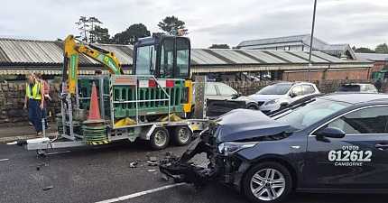 TAXI DRIVER GLAD NO ONE KILLED AFTER RUNAWAY TRAILER SMASHES INTO CAB NEAR TRURO STATION