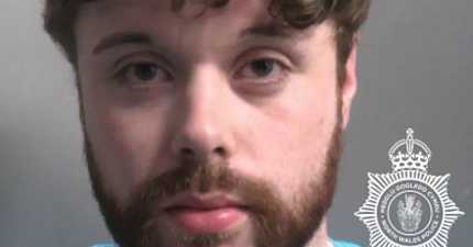 WREXHAM TAXI PASSENGER JAILED FOR FOUR YEARS AFTER RANDOM ATTACK AND ROBBERY