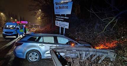 DRUNK DRIVING PRIVATE HIRE DRIVER ARRESTED AFTER CRASHING INTO WELCOME TO BOLTON SIGN