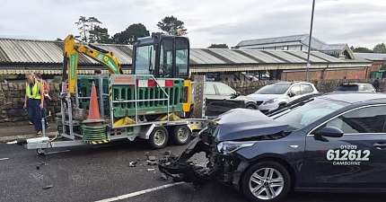 TAXI DRIVER GLAD NO ONE KILLED AFTER RUNAWAY TRAILER SMASHES INTO CAB NEAR TRURO STATION
